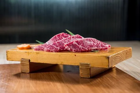 Raw beef slices with marbled texture Stock Photos