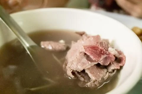 Raw beef soup Stock Photos