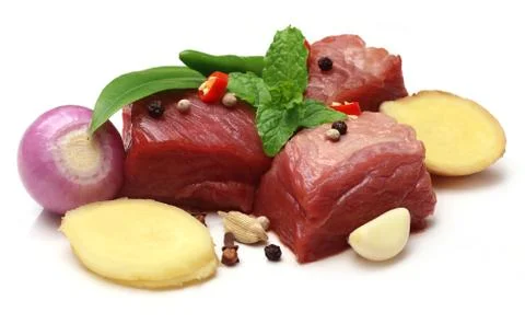 Raw beef with spices Stock Photos