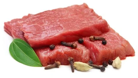 Raw beef with spices Stock Photos