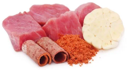 Raw beef with spices Stock Photos