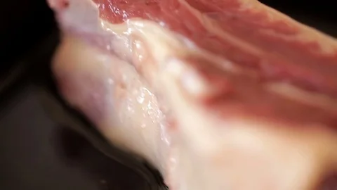 Raw beef steak with rosemary Stock Footage 78129778