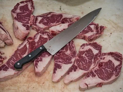 Raw beef steak served in a restaurant. Stock Photos