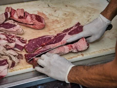 Raw beef steak served in a restaurant. Stock Photos