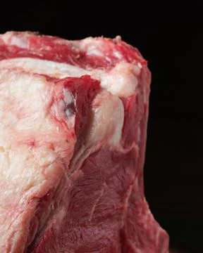 Raw beef steak, thick cut, rich red color Stock Photos