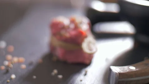 Raw beef steak tied with twine. Preparing filet mignon 動画素材 106923511