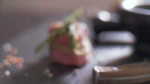 Raw beef steak tied with twine. Preparing filet mignon Stock Footage 106923824