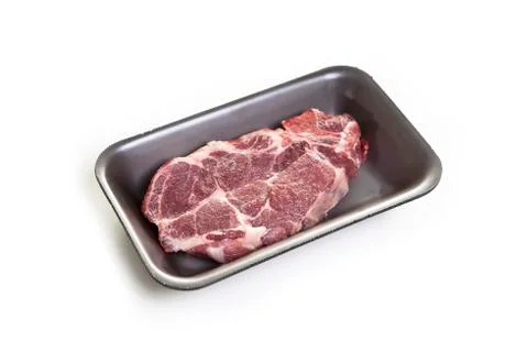 Raw beef steaks in the package isolated on white background Stock Photos