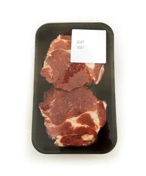 Raw beef steaks in the package isolated on white background Stock Photos