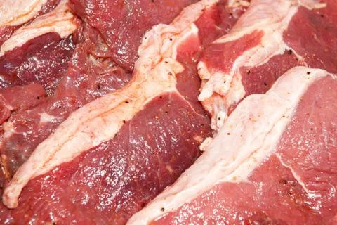 Raw beef steaks Stock Photos