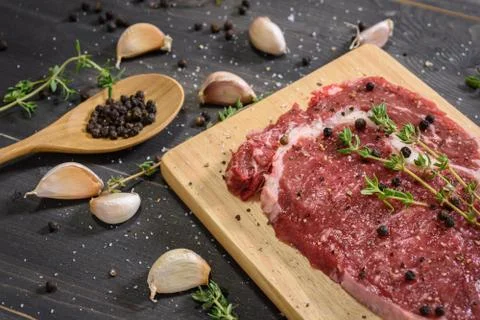 Raw beef striploin steak Stock Photos