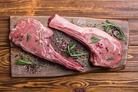 Raw beef tomahawk steak Stock Photos