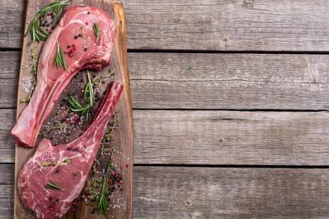 Raw beef tomahawk steak Stock Photos