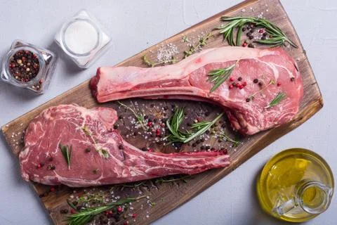 Raw beef tomahawk steak Stock Photos