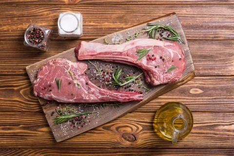 Raw beef tomahawk steak Stock Photos