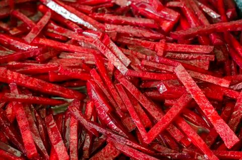 Raw beets sliced into cubes background. Stock Photos