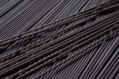 Raw black spaghetti with cuttlefish ink. Stock Photos