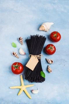 Raw black spaghetti Stock Photos