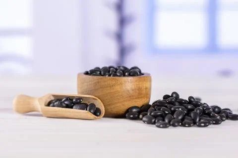 Raw black turtle beans with blue window Stock Photos