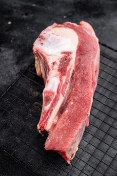 Raw bone-in beef cut combining ribs and belly area. Great for braising, roa.. Stock Photos