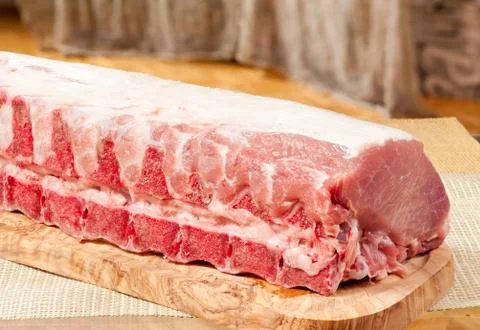 Raw bone pork chop portion Foto stock