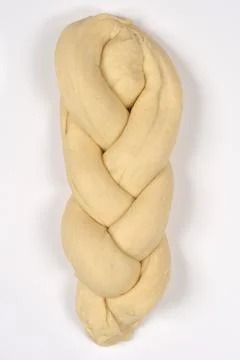 Raw braided bread dough isolated on white background Stock Photos