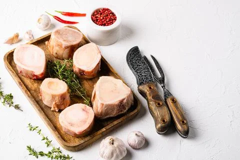 Raw brain beef bone, on white stone table background, with copy space for tex Stock Photos