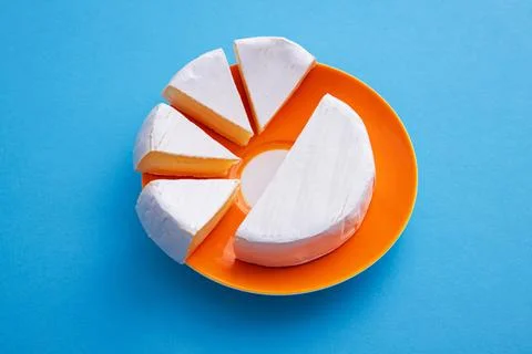 Raw brie cheese Stock Photos