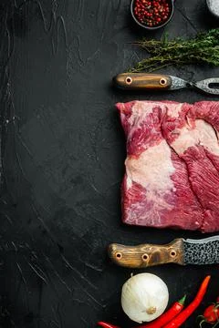 Raw brisket beef cut. Black Angus beef,with ingredients for smoking making ba Stock Photos