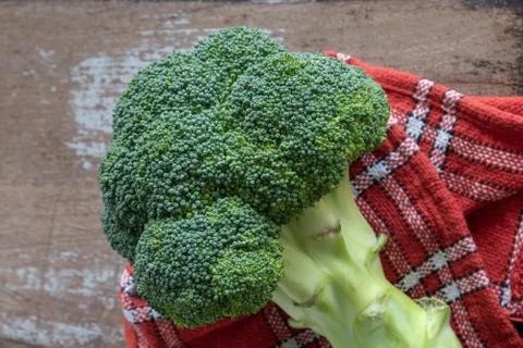 Raw broccoli on rustic wooden background Stock Photos