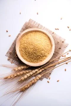 Raw Broken Wheat or Daliya or Dalia, selective focus Stock Photos