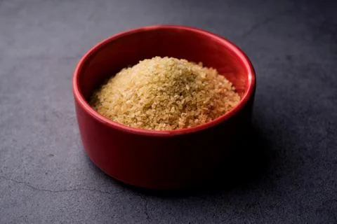 Raw Broken Wheat or Daliya or Dalia, selective focus Stock Photos