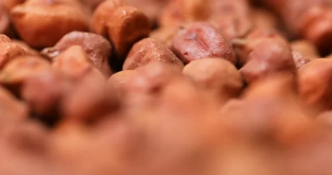 Raw brown chickpeas displayed in bulk Stock Footage 324189287