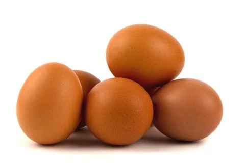 Raw brown eggs isolated on white background Stock-Fotos