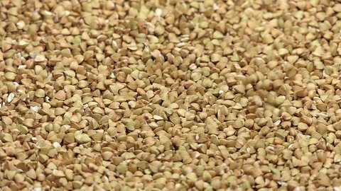 Raw buckwheat falling from top in slow motion 96 fps Stock Footage 112017393