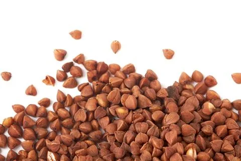 Raw buckwheat on white Stock Photos