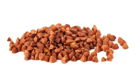 Raw buckwheat on white Stock Photos