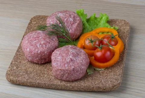 Raw burger cutlet Stock Photos
