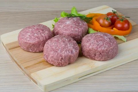Raw burger cutlet Stock Photos