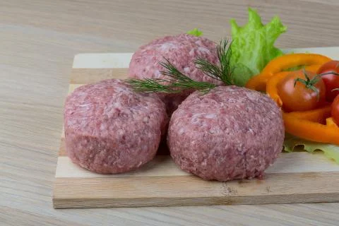 Raw burger cutlet Stock Photos