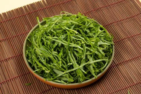 Raw cabbage leaf cut and ready to saut Stock Photos