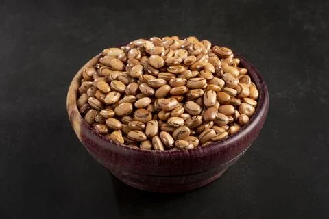 Raw carioca beans on the table. Stock Photos