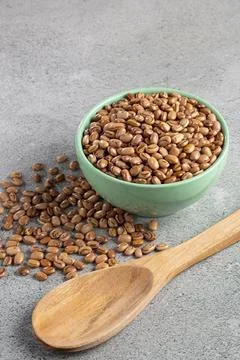 Raw carioca beans on the table. Stock Photos