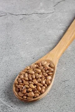 Raw carioca beans on the table. Stock Photos