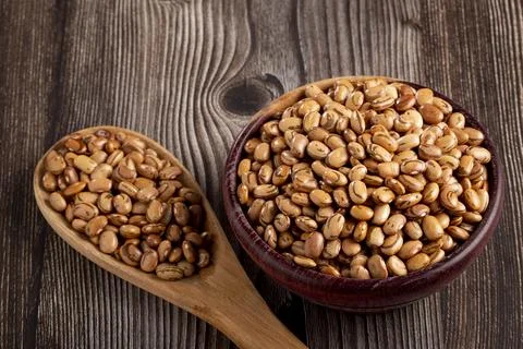Raw carioca beans on the table. Stock Photos
