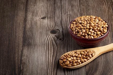 Raw carioca beans on the table. Stock Photos