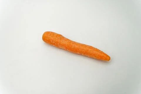 Raw carrot on white background Stock Photos