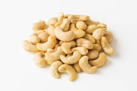 Raw cashew nuts on white background Stock Photos