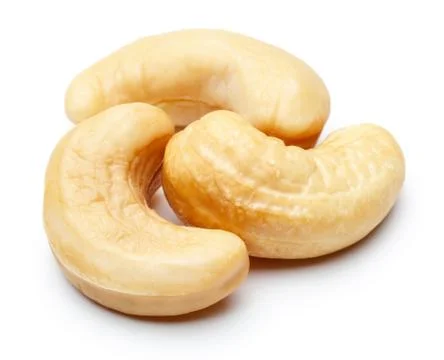 Raw cashew nuts on white background Stock Photos
