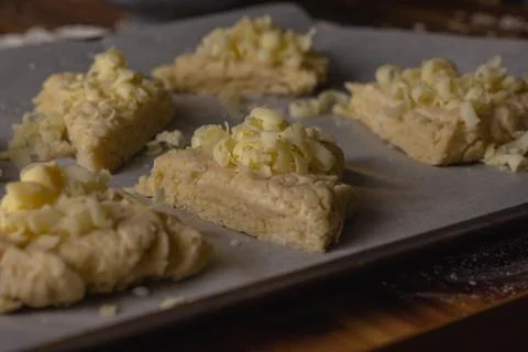 Raw cheese scones viewed from the side Foto stock